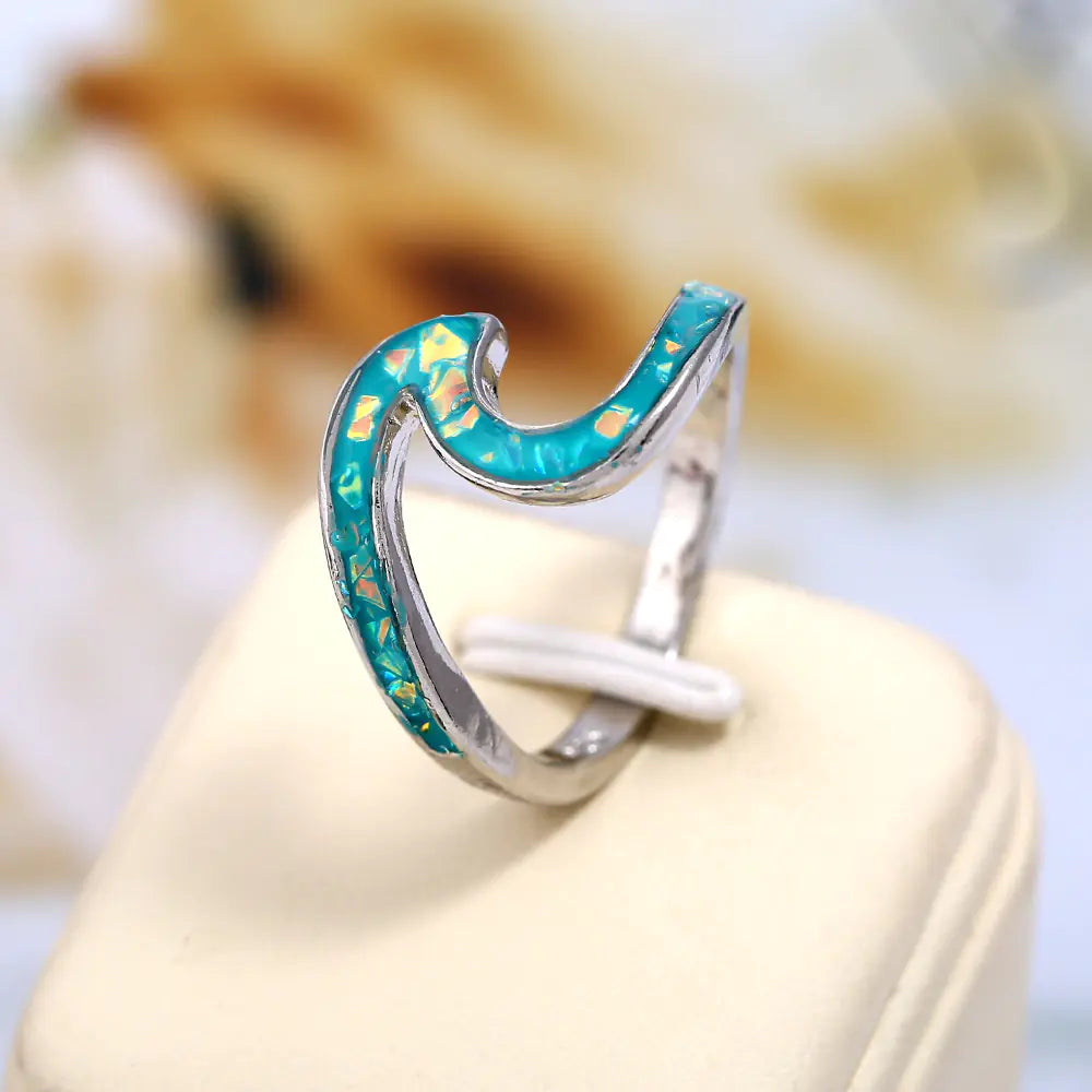 The Devori Jewelry Opal Blue and Opal White Wave Ring